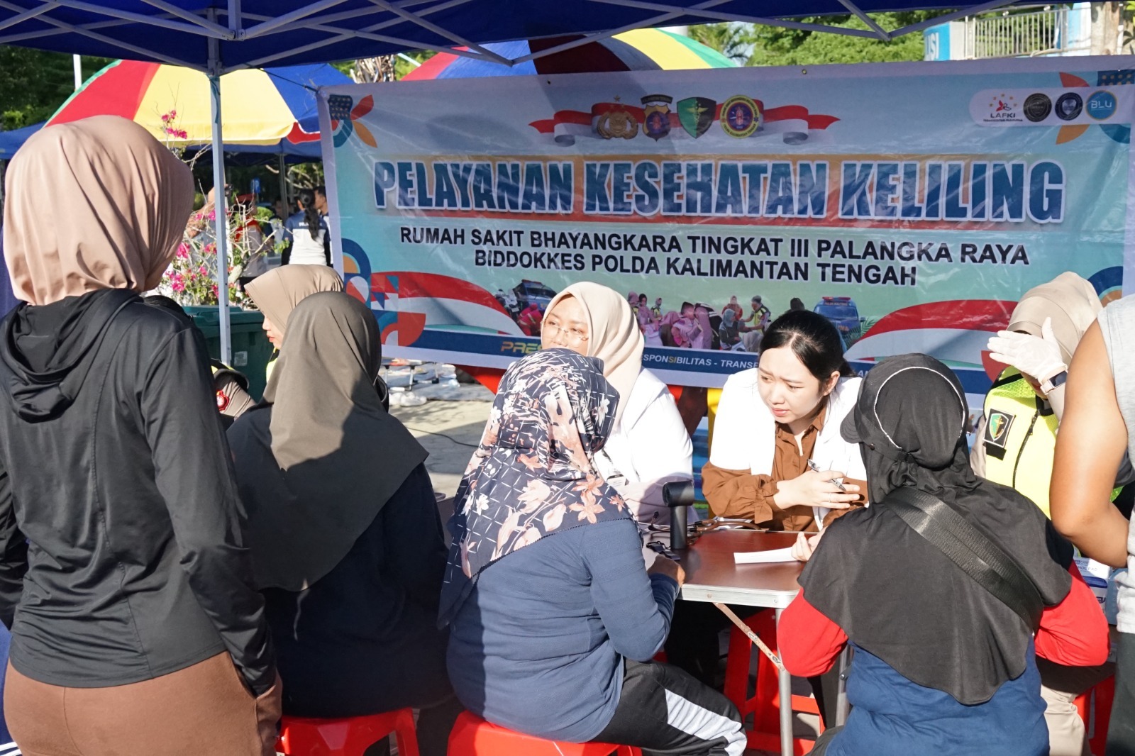Tingkatkan Kesadaran Hidup Sehat, Rumkit Bhayangkara Berikan Layanan Kesehatan Gratis di CFD